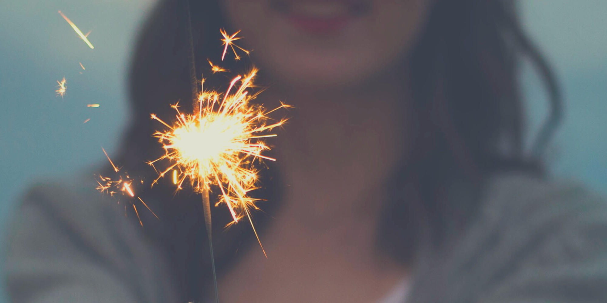 Hand holding sparkler